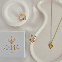 A perfect trio- heart earrings,  heart necklace and gold ring